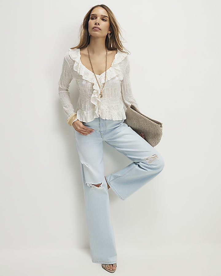 Blue relaxed straight ripped jeans