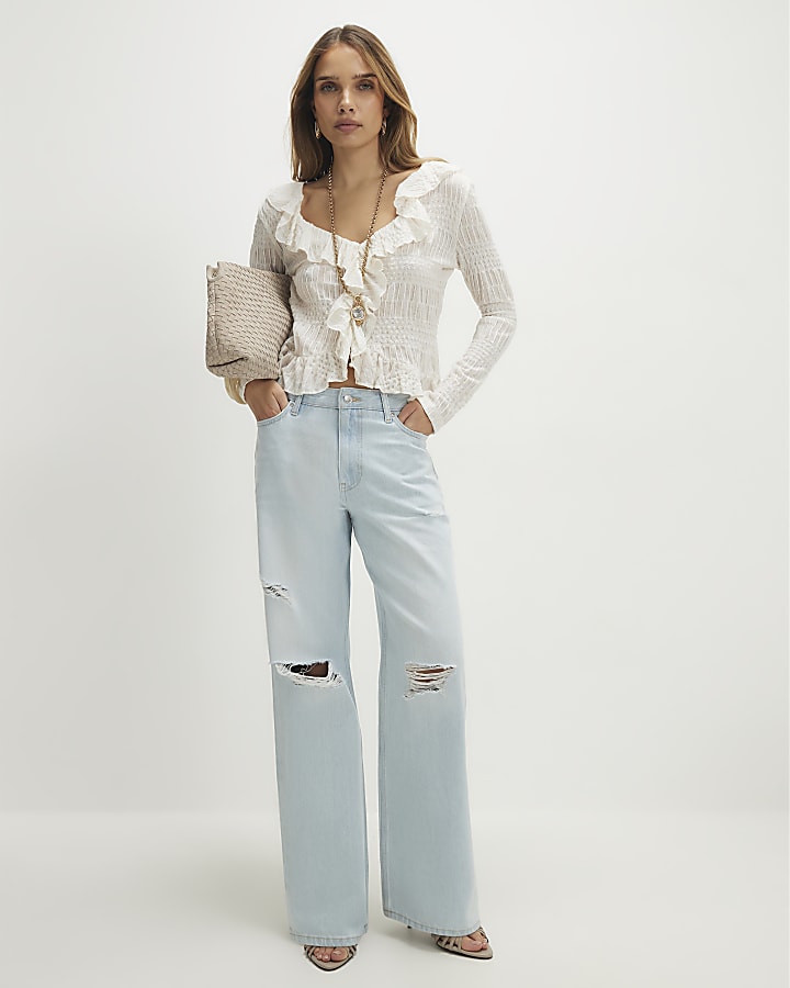 Blue relaxed straight ripped jeans