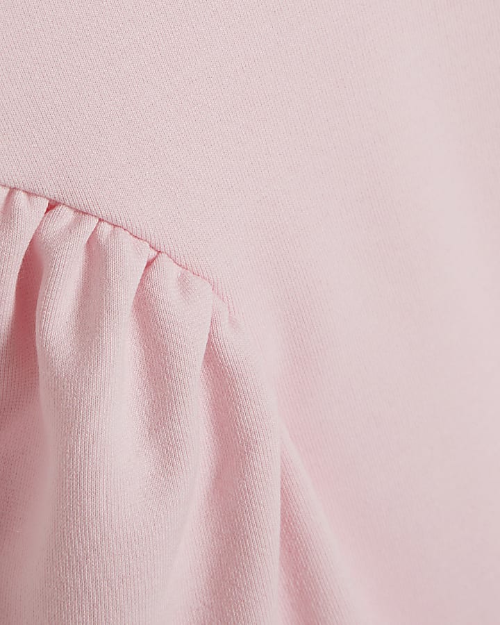 Pink Sleeveless Peplum Top