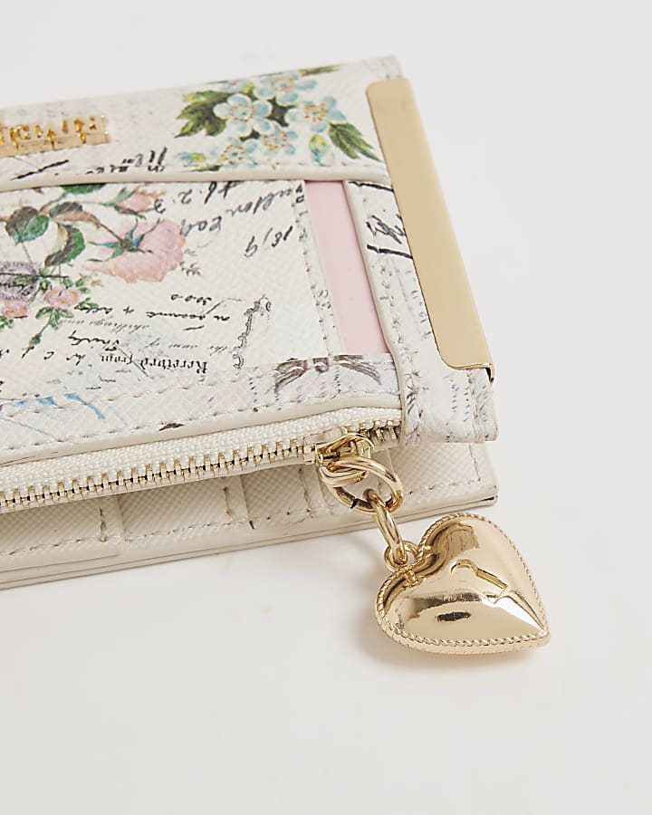 Cream Newsletter Print Purse