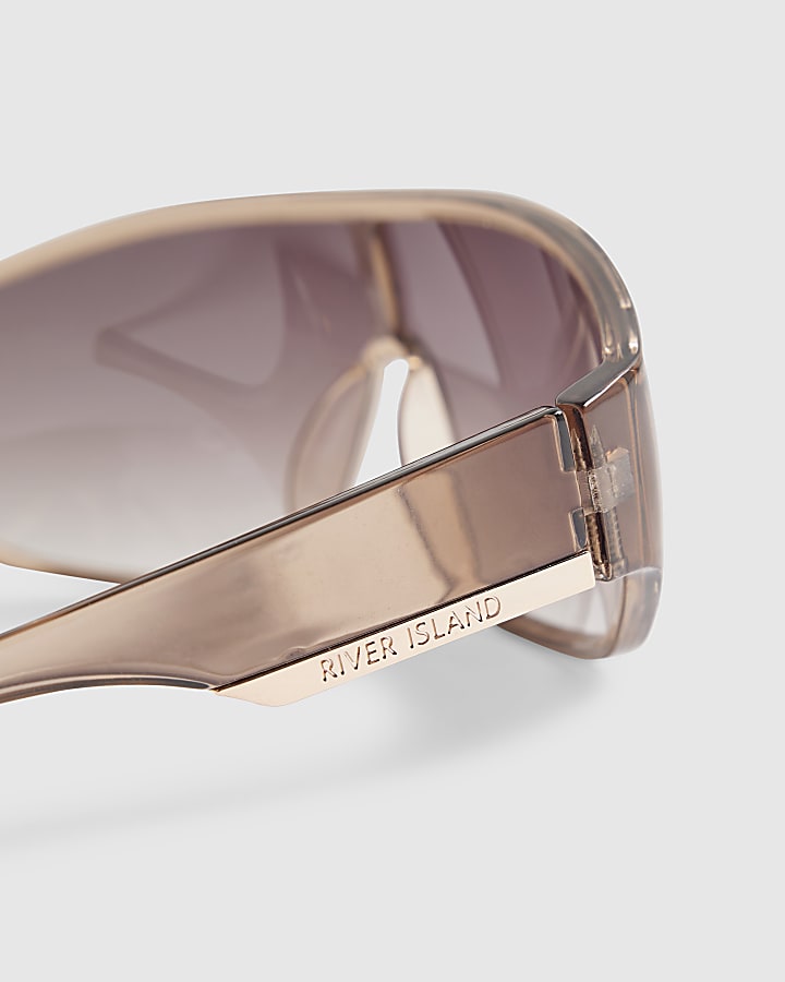 Pink wrap around visor sunglasses