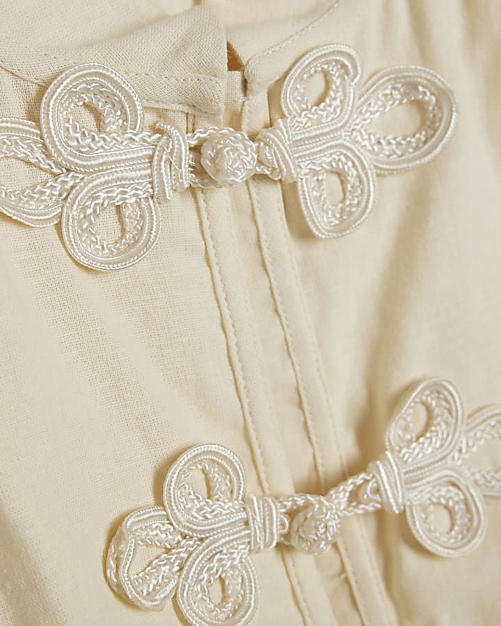 Cream Sleeveless Stand Up Collar Drummer Top