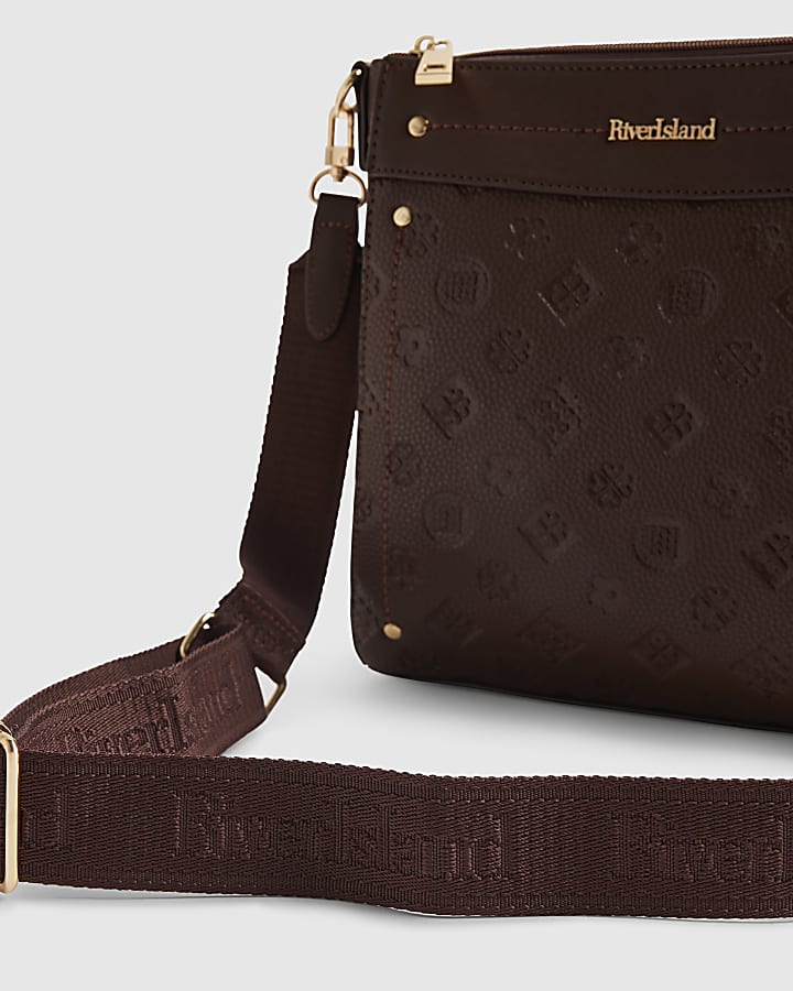 Red Monogram Embossed Messenger Bag