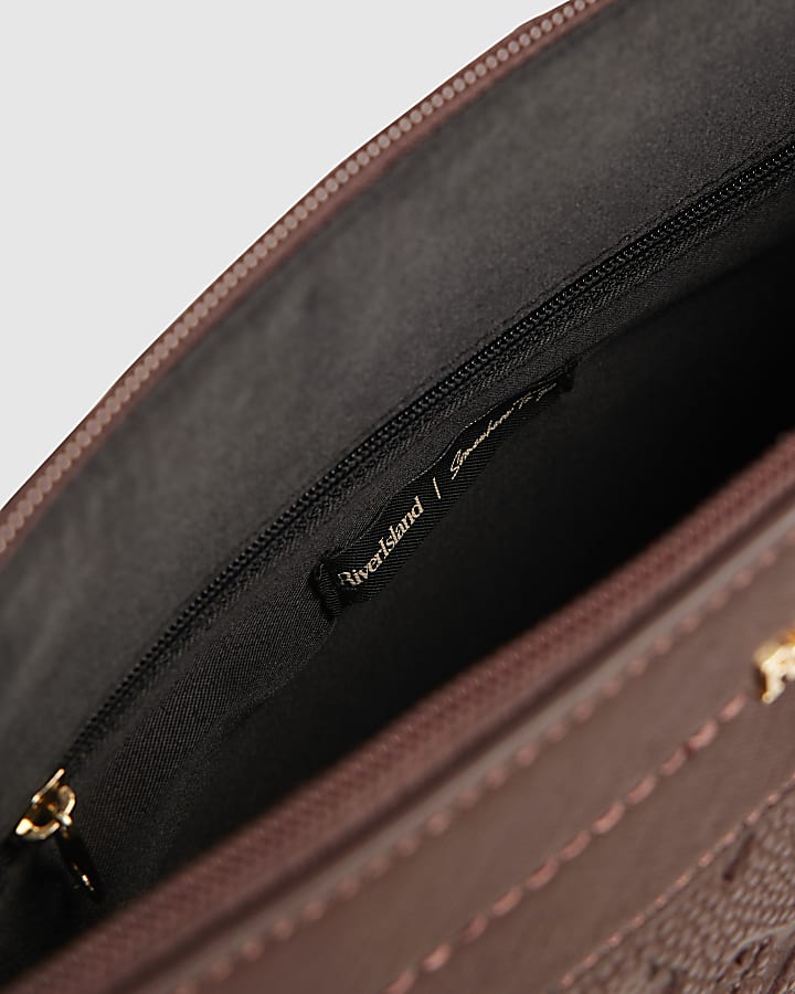Red Monogram Embossed Messenger Bag