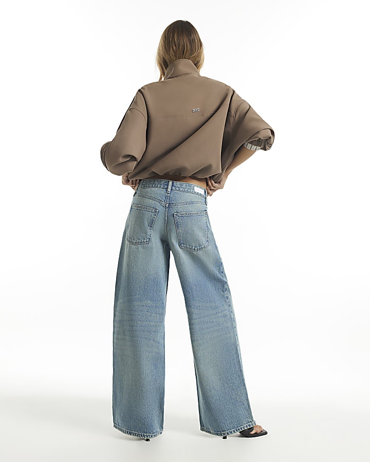 Blue Washed Asymmetric Fly Barrel Leg Jeans