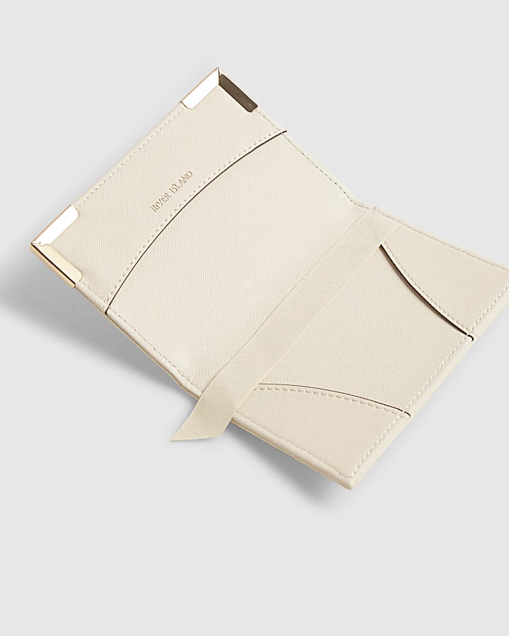 Cream Embossed Monogram Passport Holder