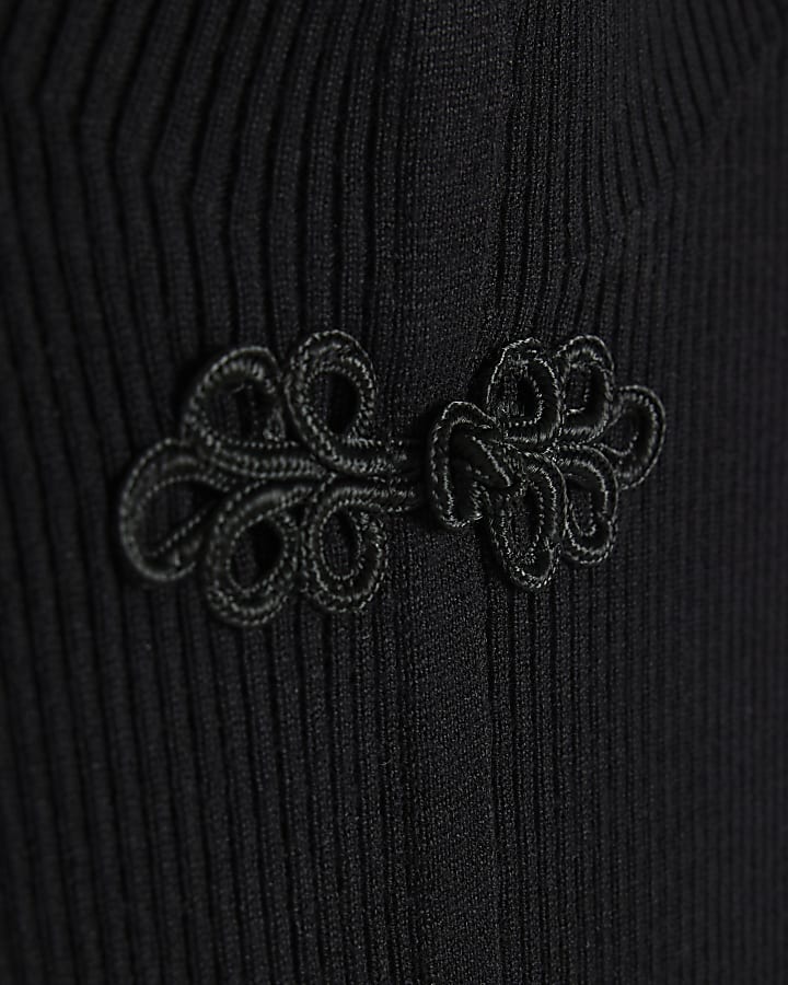 Black Drummer Boy Sleeveless Knit Top
