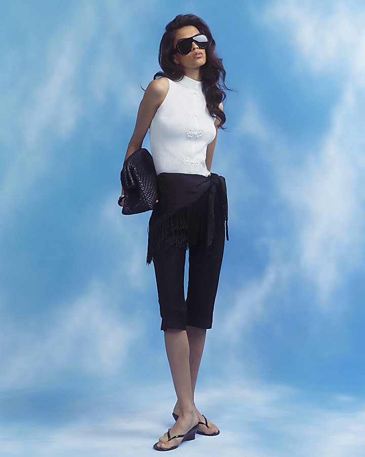 Cream Drummer Boy Sleeveless Knit Top