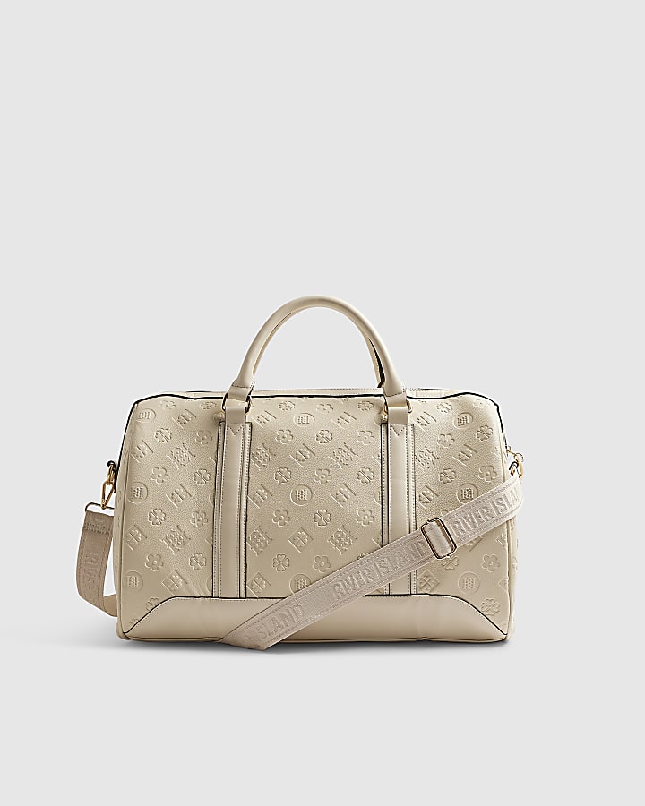 Cream Embossed Monogram Barrel Bag