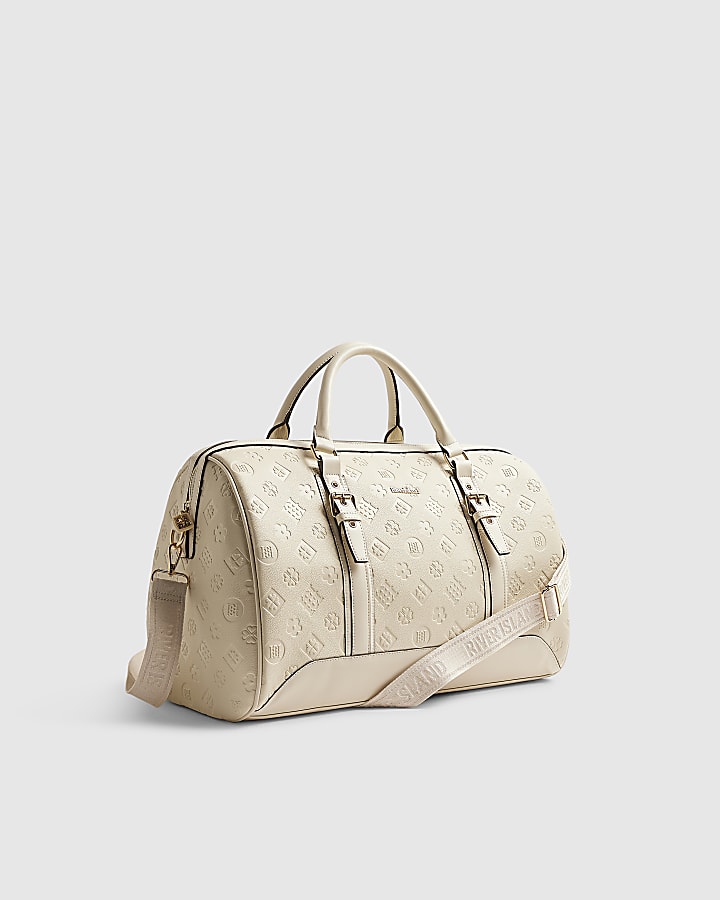 Cream Embossed Monogram Barrel Bag