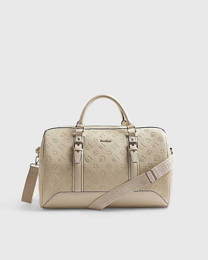 Cream Embossed Monogram Barrel Bag