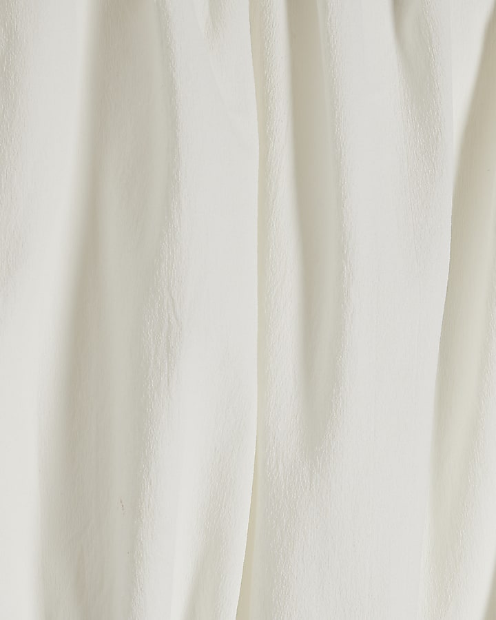 White Sleeveless Bandeau Bubble Hem Top