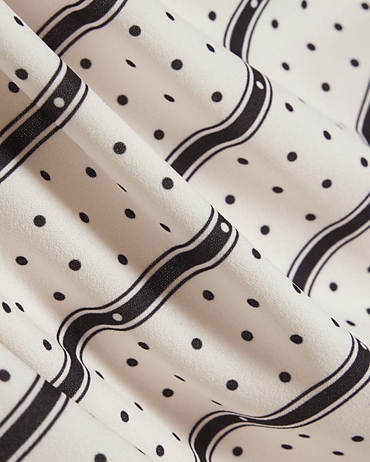 White Spot Print Drape Peplum Top