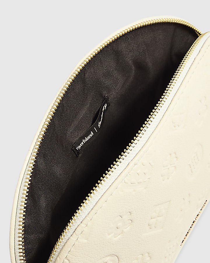 Cream Embossed Monogram Makeup Bag