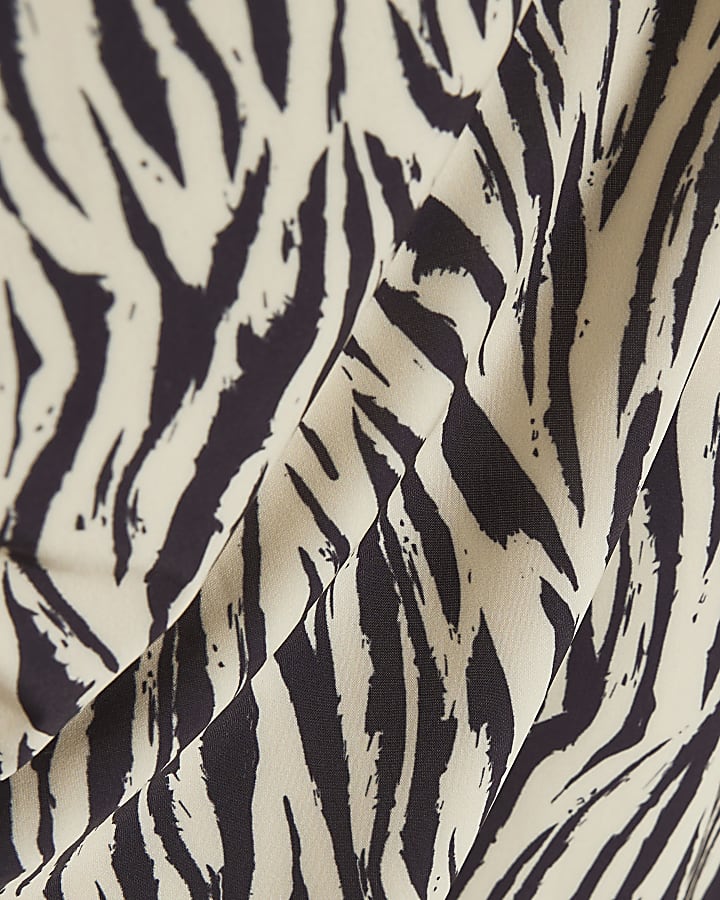 Cream Zebra Print Asymmetric Hem Flowing Top