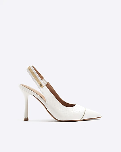Cream embossed heeled court shoes