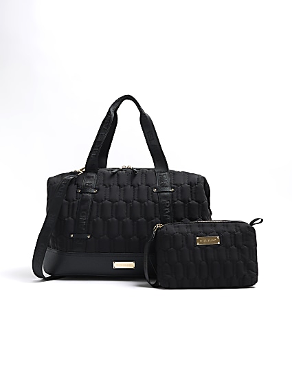 Black quilted travel and makeup bag