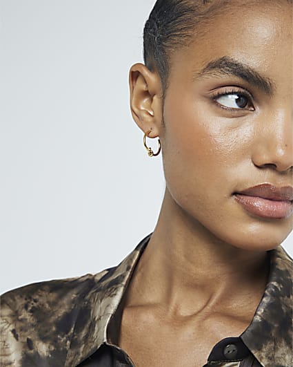 Gold flower open circle drop earrings River Island