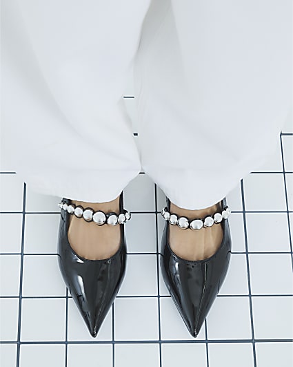 Black Strapped Sling Back Flat Shoes