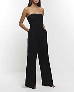 White jumpsuit river store island