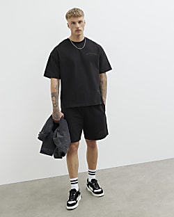 Black Oversized Essentialism 1974 T-Shirt
