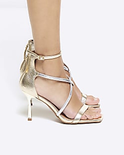 Gold closed back strappy heeled sandals River Island