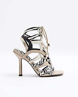 Beige animal print caged heeled sandals River Island