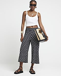Black floral crop wide leg trousers River Island