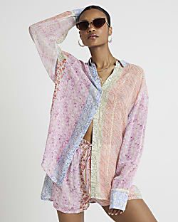 Pink floral pull on shorts River Island