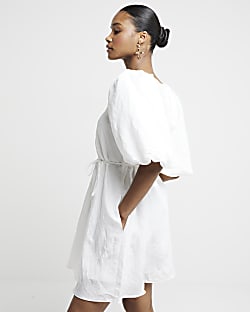 White belted puff sleeve swing mini dress