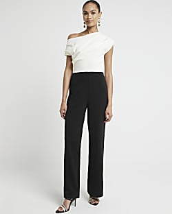 Green drape off shoulder jumpsuit River Island
