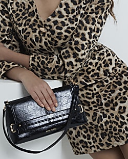 Small black clutch clearance