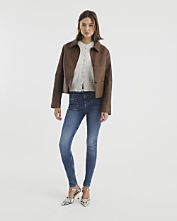 Blue high waisted pocket super skinny jeans