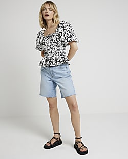 Black shirred floral puff sleeve blouse