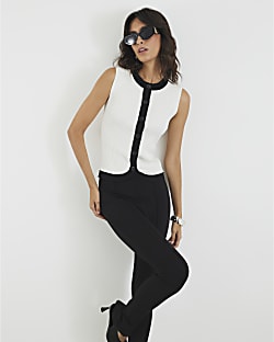 White Sleeveless Curved Hem Ribbed Top