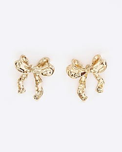 Gold bow stud earrings