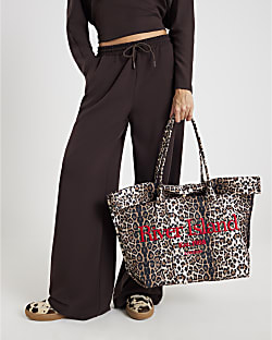 Beige Leopard Print Roll Top Holdall Bag