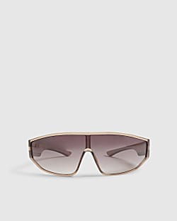 Pink wrap around visor sunglasses