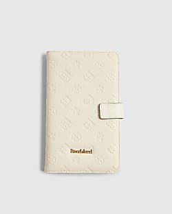 Cream Embossed Monogram Travel Wallet