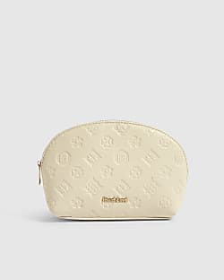 Cream Embossed Monogram Makeup Bag