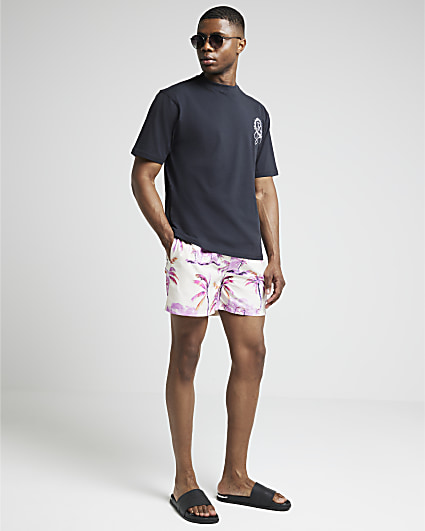 Pink regular fit palm tree swim shorts