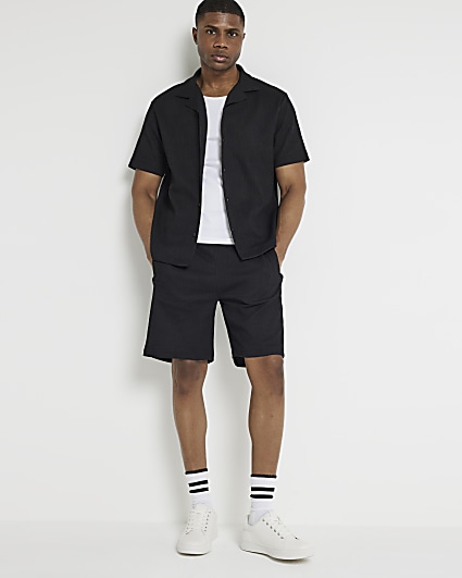 Black regular fit plisse shorts