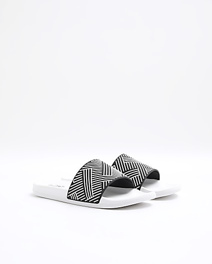 White embossed geometric sliders