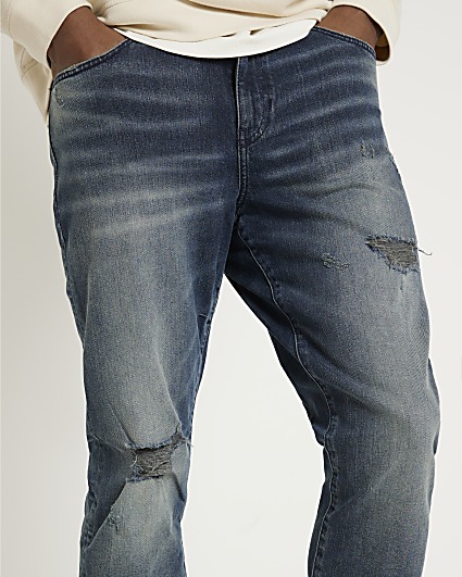 Blue faded skinny fit ripped jeans