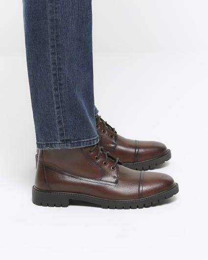 Brown leather combat boots