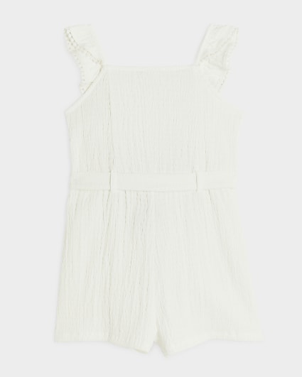 Girls white belted frill playsuit