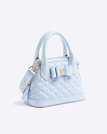 Girls blue quilted bow cross body bag