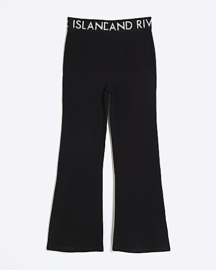Girls black elasticated flare trousers