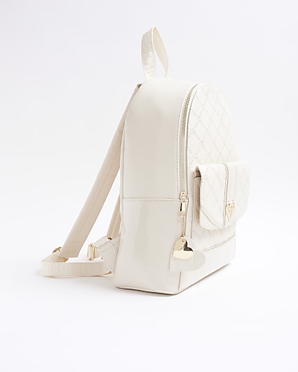 Girls cream embossed monogram backpack