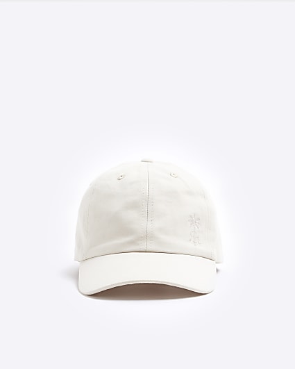 Mini cream embossed cap